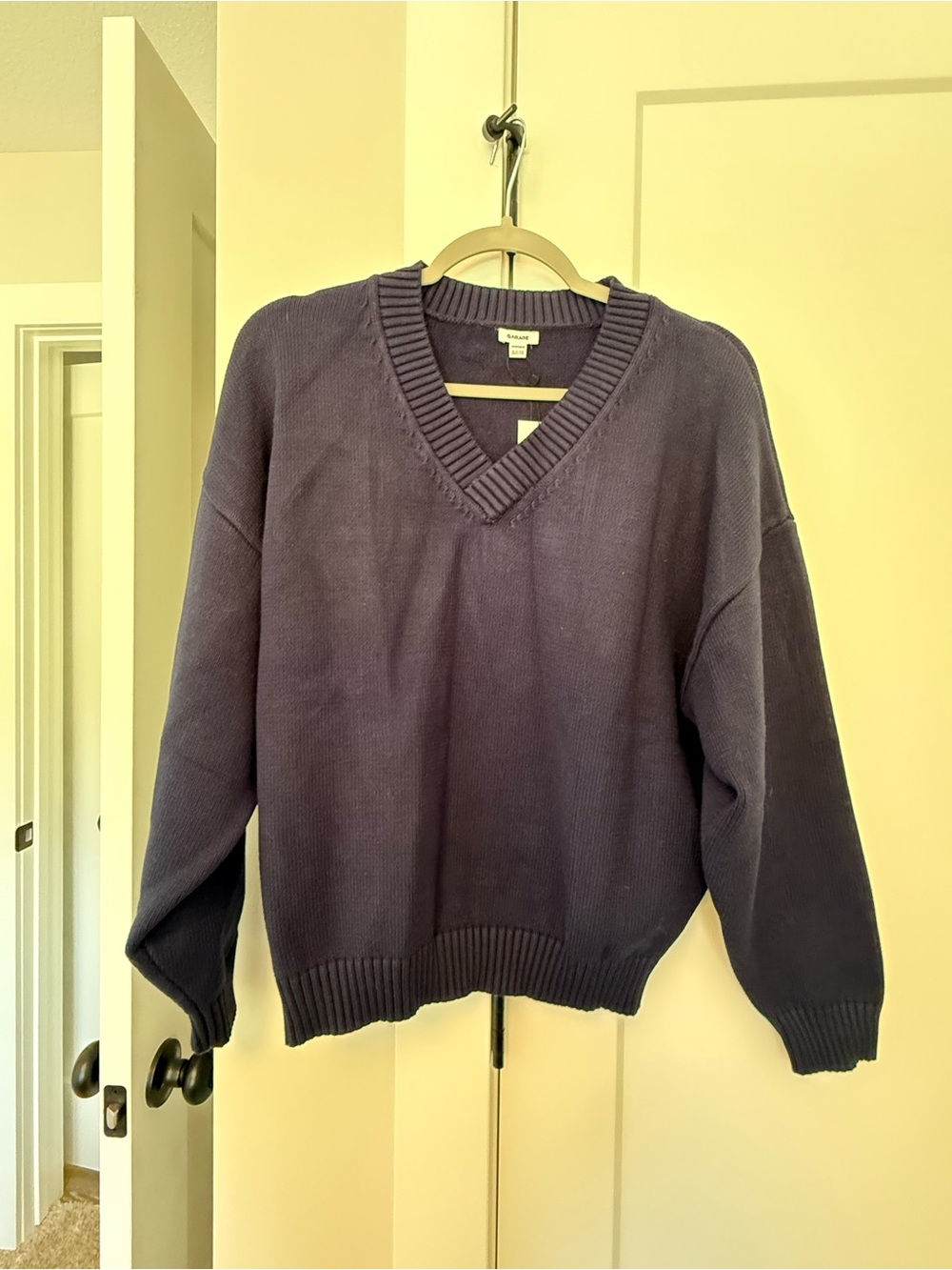 Garage Women’s V-Neck Sweater in Navy Blue